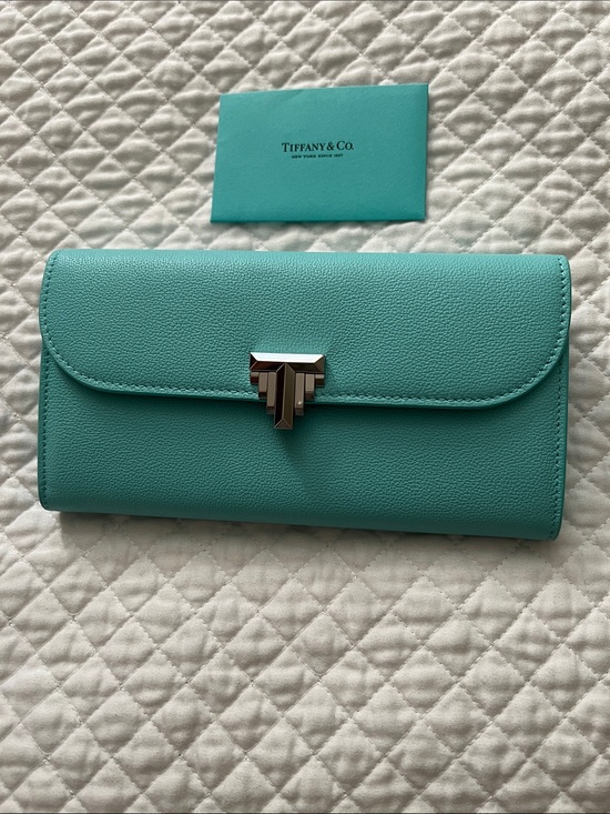 Tiffany & Co. Handbags - New! Tiffany & Co. Turquoise Leather Clutch with Silver-Tone Push Lock
